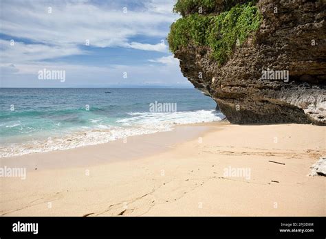 Dreamland Beach In Uluwatu Bali Indonesia With Its Majestic Cliffs