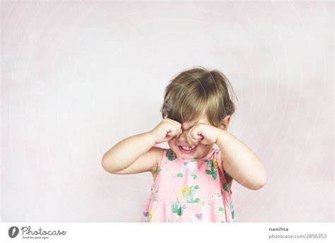 Sad Blonde Little Girl A Royalty Free Stock Photo From Photocase