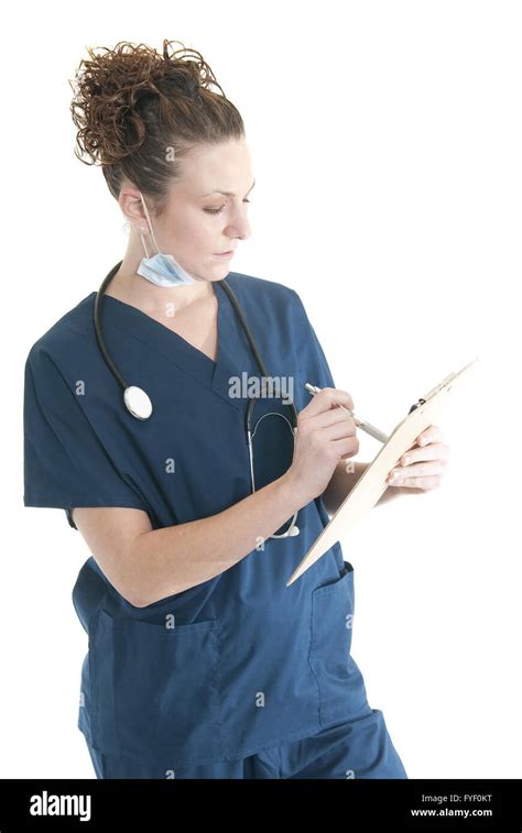 Nurse Writing On A Clipboard Stock Photo Alamy