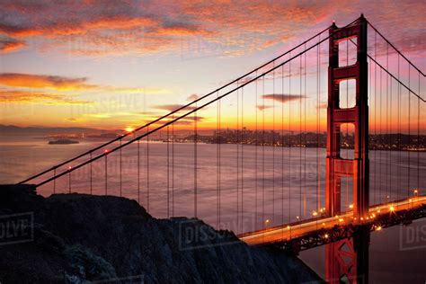 Moment Of Sunrise Above The Golden Gate Bridge With San Francisco
