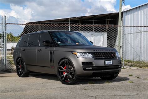 Wrapped matte dark grey, all accents painted black, brake calipers painted red, sitting on @avorza… Gallery: Matte Grey Range Rover on Forgiato Wheels