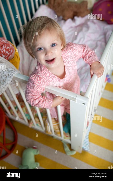 Baby Standing Up In Crib Hi Res Stock Photography And Images Alamy