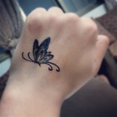Butterfly On Hand Tattoo Small Butterfly Hand Tattoo Check Spelling