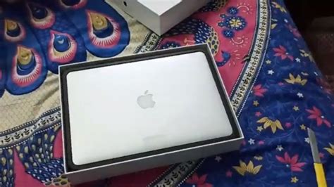 Apple is offering a new magic. Unboxing Apple MacBook Air i5 5th Gen - YouTube