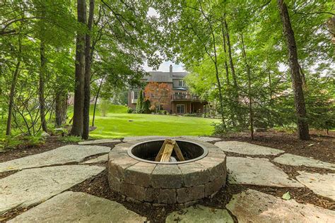 Rustic Fire Pit In Brighton Michigan Landscape Professionals