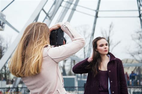 photographer shooting a girl by stocksy contributor danil nevsky stocksy