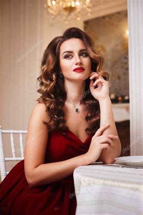 Close Up Portrait Of Beautiful Young Woman In Gorgeous Red Velvet