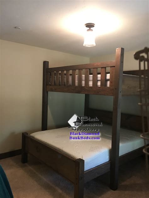 A trundle bunk bed can be a good idea for families with enough space for each child to have his or her own rolling the bottom bed into a perpendicular position below the upper bunk means extra play. Promontory Custom Bunk Bed