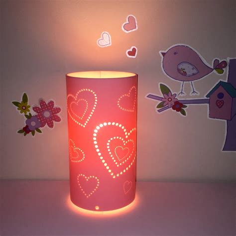 From tall and stout lamp bases to thin and thick ones, you'll not only love having a bright room to walk into, but also the way the lamp complements the rest of your home decor. Heart Table Lamp By Kirsty Shaw | notonthehighstreet.com