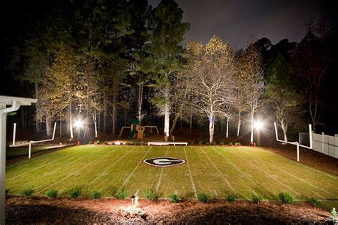 Football players in fight for ball. Dream Backyard (Outdoor Lighting) - Replica Sanford ...