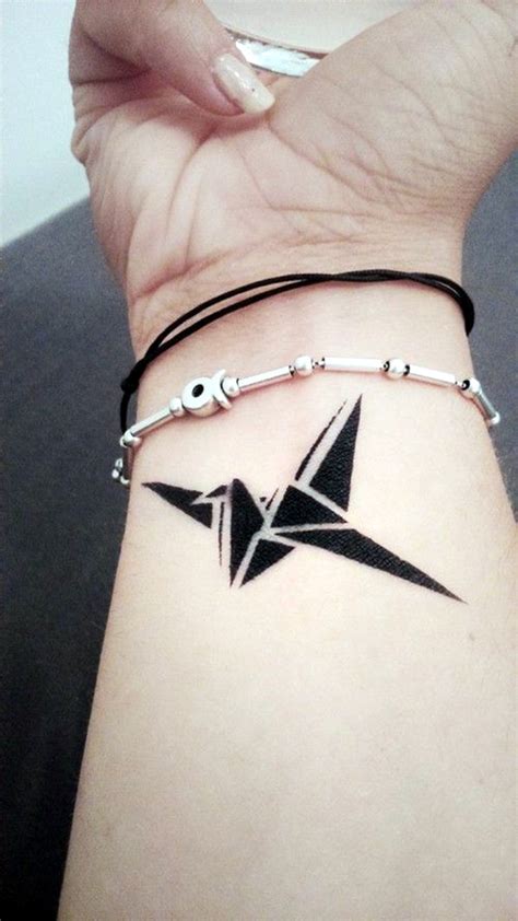 The play on shadow and light creates a 3d effect all captured within a shadowbox. 40 Lovely Origami Tattoo Designs (In Trend)