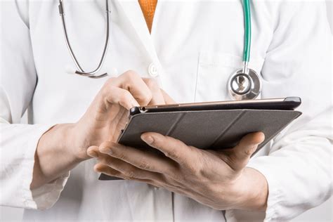 Doctor With Tablet Free Stock Photo Public Domain Pictures