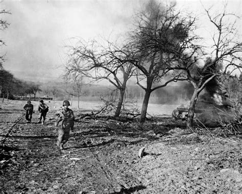 Us Soldiers Advance Under Fire To The Saar River February 1945 The