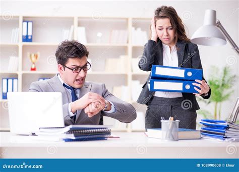 The Angry Boss Unhappy With Female Employee Performance Stock Photo