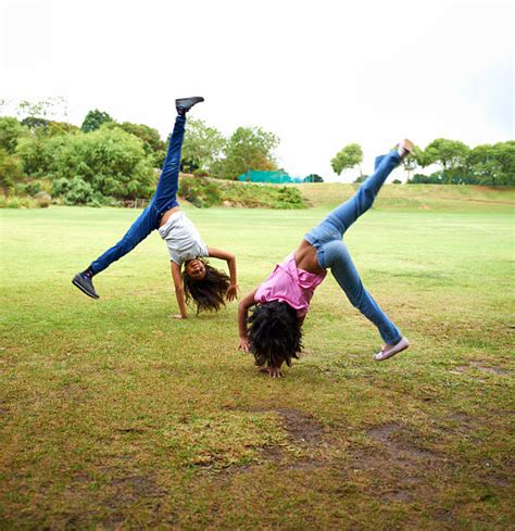 Child Cartwheels Stock Photos Pictures And Royalty Free Images Istock