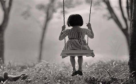 Girl On A Swing Photo
