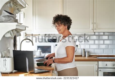 Side View Confident Mature Woman Kitchen Stock Photo 2231321427