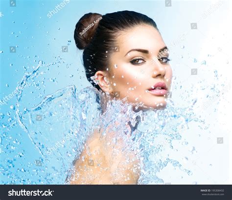 Beautiful Model Woman With Splashes Of Water In Her Hands Beautiful