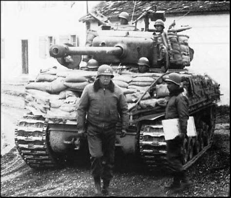 George Patton In Front Of An M4a3e8 Sherman Of The 14th Armored