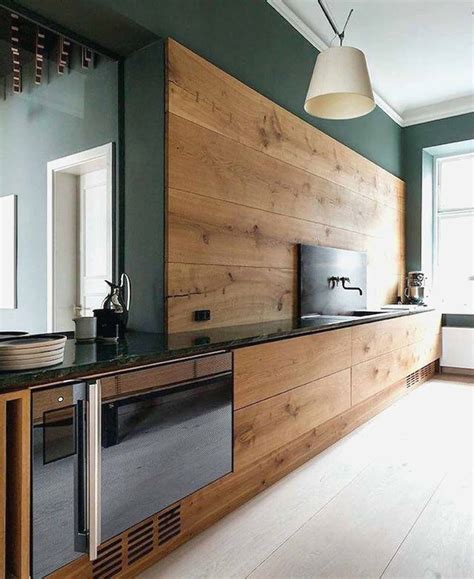 I love the clean crown molding on these cabinets combined with the brass hardware. Is "No Hardware" the New Hardware Trend for Kitchens?