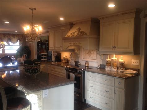 The grey cabinet, golden hardware, and pops of wooden texture make this a really interesting spot to be. French inspired kitchen (With images) | Kitchen, Kitchen ...