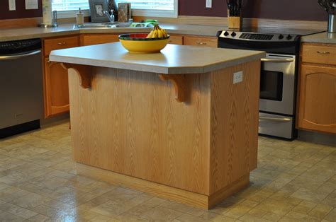 Not every kitchen is graced with an island, but that doesn't mean you can't make your space functional. The Dizzy House: Customizing Your Not-So-Custom Kitchen Island