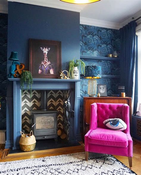 Dark Blue Living Room Walls With Fuchsia Pink Velvet Accent Chair And
