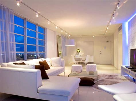 A mix of overhead lights and lamps is best. Lighting Tips for Every Room | HGTV