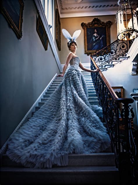 Woman In Elegant Gown On A Grand Staircase Glamour Photo Shoot