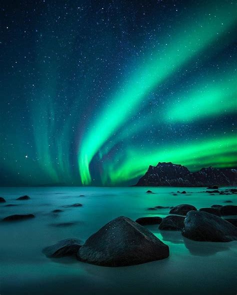 Magical Northern Lights Lit Up The Sky In Uttakleiv Beach
