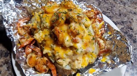 Pierce potatoes with fork or small sharp knife; Loaded Shrimp Bake Potatoes / Ray Mack's Kitchen & Grill ...