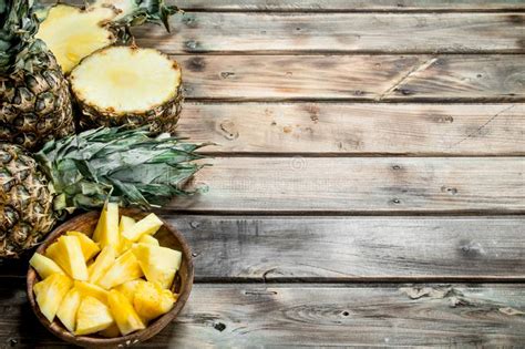 Slices Of Pineapple In A Bowl And Fresh Pineapple Stock Image Image