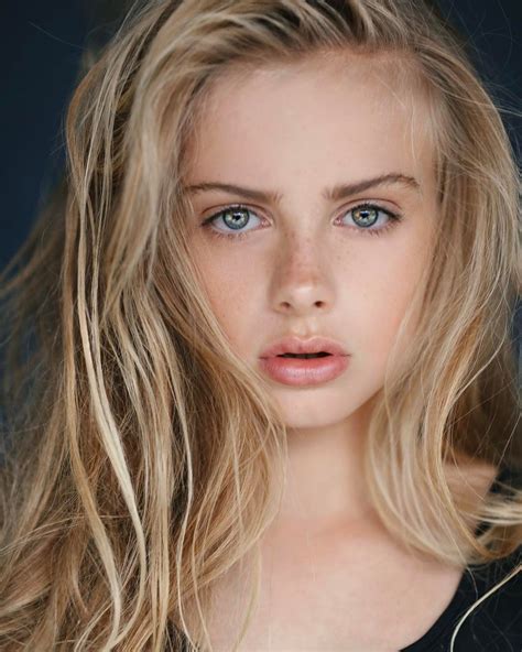 Girl With Blue Eyes And Light Blonde Hair