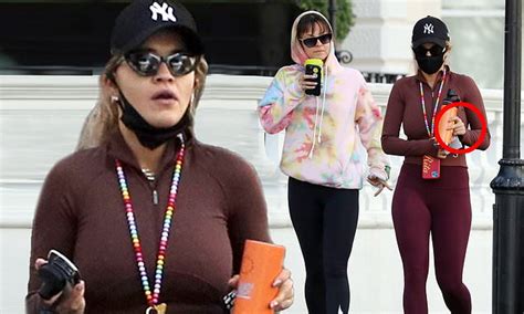 Rita Ora Whips Off That Diamond Ring In Workout Gear Daily Mail Online