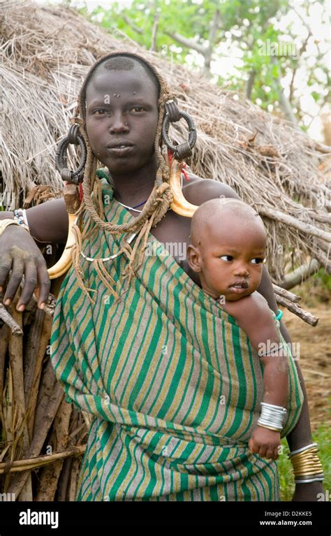 Portrait Of Mursi Mother And Child Stock Photo Alamy