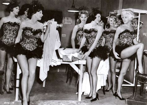 chorus line dancers and can can girls from the 1920s 1960s corset outfits 1980s pop culture