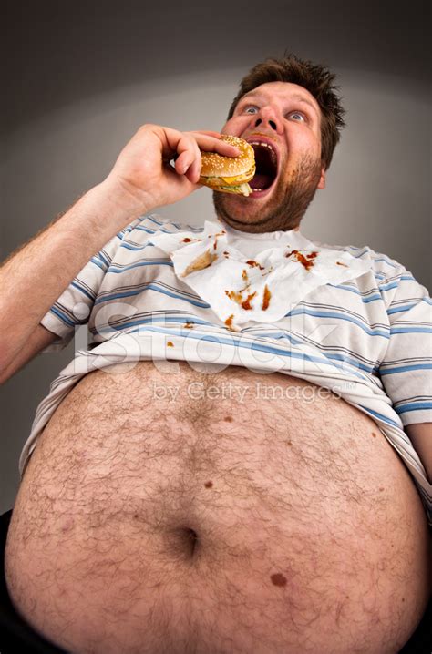 Fat Man Eating Burger Stock Photo Royalty Free Freeimages