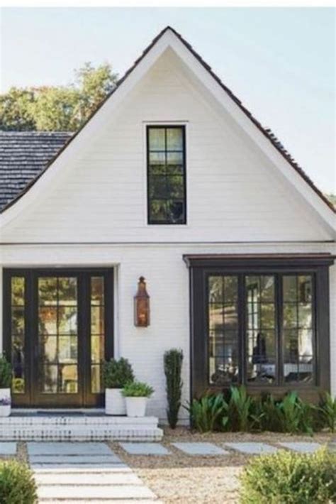 Boost your home's curb appeal with these here's a list of the trendiest house paint colors that will inspire you to move ahead with your for a real pop of color, consider a shade of mustard yellow, which works well on both historic and modern. Modern Farmhouse Style Exterior Paint Colors in 2021 ...