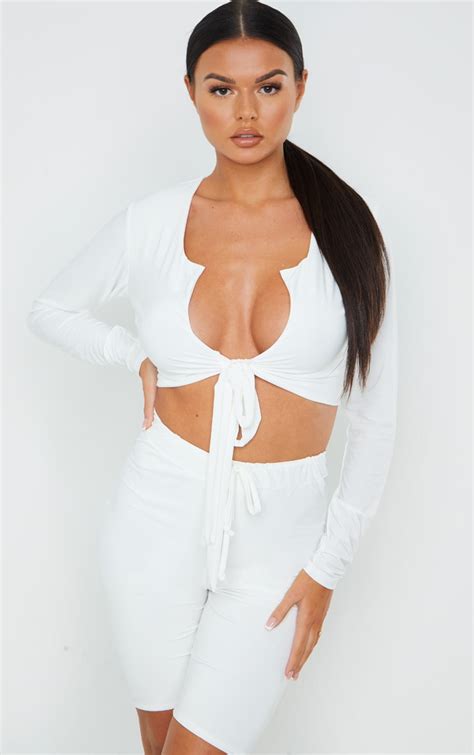 Cream Slinky Long Sleeve Cut Out Tie Front Crop Top Prettylittlething