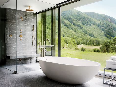 They're a perfect prelude to romance. A large shower and bathtub with mountain views in Aspen ...