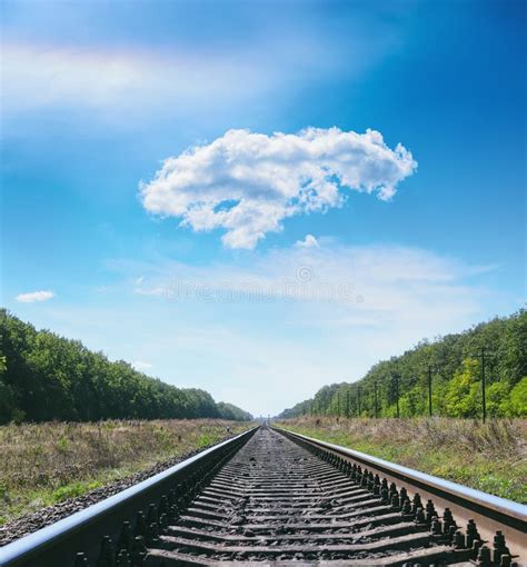 Railroad To Horizon In Blue Sky With Clouds Stock Image Image Of