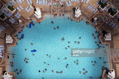 Crowded Swimming Pool Photos And Premium High Res Pictures Getty Images