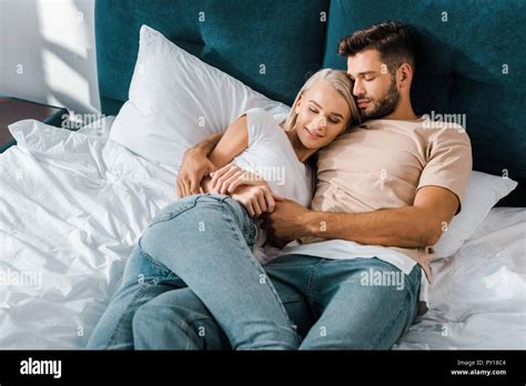 Couple Hugging In Bed Hi Res Stock Photography And Images Alamy