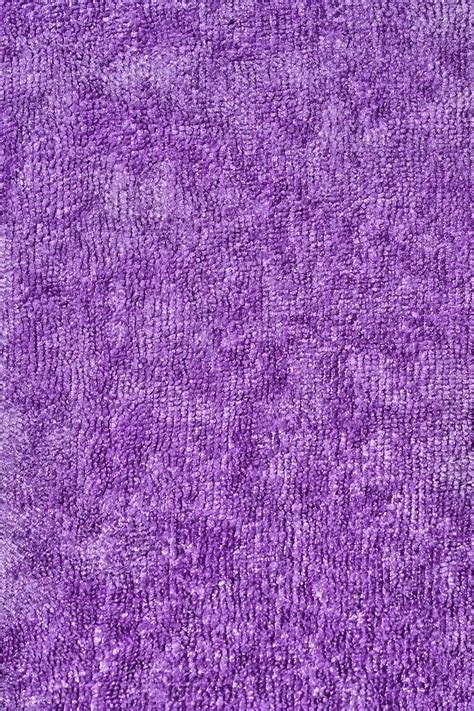 Fabric Texture From A Purple Towel Background