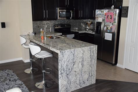 The floor is white tile with a tiny bit of marble effect (very slight) i think the granite will look fine since it is it sounds as though the op already has this white ice granite (with a decorative edge) and is. White Ice Granite Countertops (Pictures, Cost, Pros and Cons)