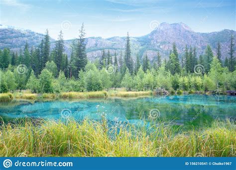 Nature Mountain Scene With Beautiful Lake And Mountains In Summer Or
