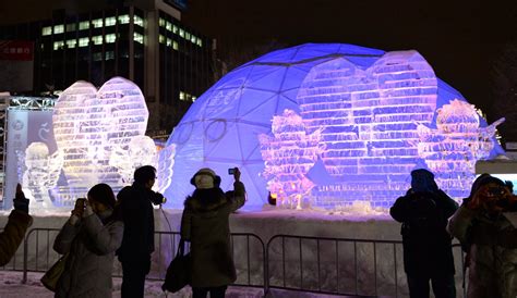 65th Annual Sapporo Snow Festival In Japan Night View With Lights