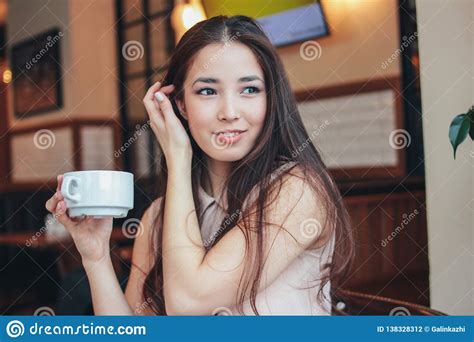 Beautiful Charming Romantic Brunette Smiling Asian Girl Has Breakfast