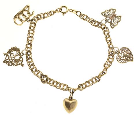 Lot 14k Gold Charm Bracelet And Charms