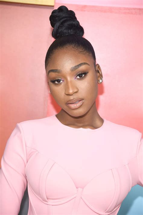 Normanis Towering Topknot Is Out To Elevate The Updo Game Vogue